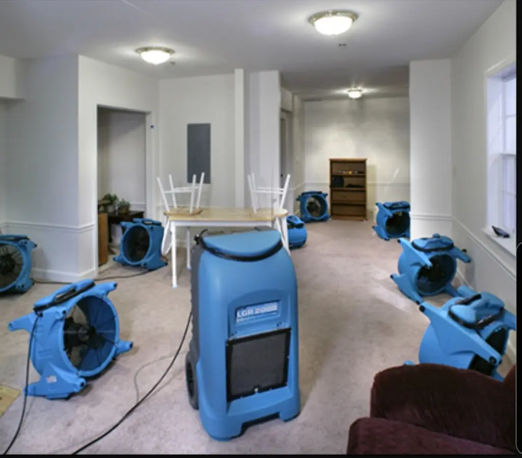 Air movers and dehumidifier setup for Water Extraction & Removal in Tomball